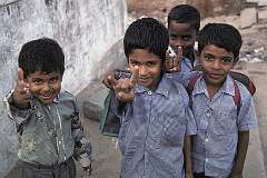 Young boys coming back from school in a village in the southern outskirts of Chennai.