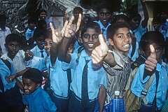 Exuberant boys, in school uniforms, south Chennai.