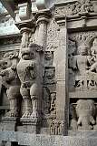 Sculptures of mythical lions along the passage with its shrines built into niches in the Kailasanathar Temple.