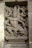Sculpture of Shiva in one of 58 small shrines in niches along the inner wall of the the Kailasanathar Temple, built in the late 7th century.
