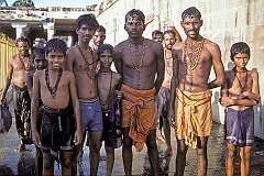 Young men and boys during their walk between “theertham”, sacred wells. Pilgrims often bathe in these theerthams, believed to have been created by Lord Rama to wash away the sin of killing Ravana.