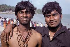 Two young men on the beach, in the holy city of Rameswaram.