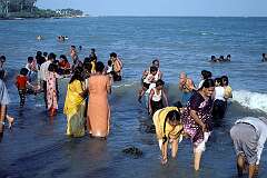 Devotees bathing in the sea in Rameswaram.