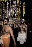 Celebrants carrying the richly decorated platform around the temple, a major South Indian pilgrimage centre.