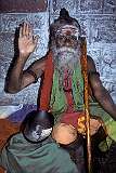 A “sadhu”, holy man, begging on the steps leading to the Dhandayuthapani Swamy Temple, the temple dedicated to Lord Murungan.