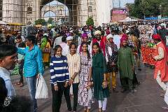 Posing for photos in front of the Charminar.