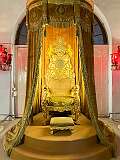 Osman Ali Khan, Asaf Jah VII's throne, with the Hyderabad State Coat of Arms, in H.E.H (His Exalted Highness) the Nizam's Museum at Purani Haveli, a palace of the erstwhile Nizams.