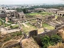 View towards Hyderabad of the ruined city from the hill at Golconda Fort, a fortified citadel, the capital of the Golconda Sultanate. The Qutb Shahi sultans ruled Golconda for 171 years, until Aurangzeb conquered the Deccan in 1687.