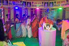Women honouring a recently deceased guru, in a Hindu “puja” ceremony, Agartala.