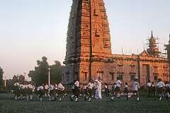 School children in front of a temple in Sarnath, where the Buddha preached his first discourse to his first five disciple, around 528 BCE.