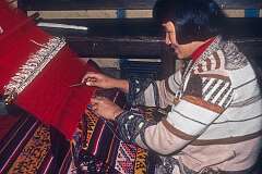 Yishey Wangmo weaving a carpet at Jangsa Gompa, a Bhutanese Monastery in Kalimpong.