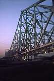 The Howrah Bridge, a balanced cantilever bridge over the Hooghly River, Kolkata. Commissioned in 1943 it was renamed Rabindra Setu after the great Bengali poet Rabindranath Tagore, in 1965.