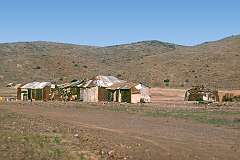 Damara huts along the road to Uis, at the foot of Brandberg Mountain (Dâures).