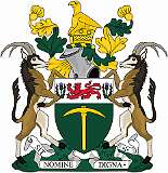 SOUTHERN RHODESIA, 1924 - On 11 August 1924, a coat of arms of the self-governing British colony of Southern Rhodesia was adopted. It featured the shield, as it also appeared on the flag, with a pick in gold on a green field, representing mining. Two sable antelopes supported it, and at the top was a soapstone statuette of the Zimbabwe Bird, found in the ruins of Great Zimbabwe. On a scroll is the Latin motto “Sit Nomine Digna”, “May she be worthy of the name”.