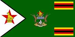 PRESIDENTIAL FLAG OF ZIMBABWE, 1987 - In 1987, Robert Mugabe, who had been Prime Minister since Zimbabwe’s independence in 1980, became Executive President after the constitution was amended and a Presidential Flag was adopted. It is green, with a white triangle at the hoist featuring the red star and the Great Zimbabwe bird in yellow, and at the fly, two panels with the Pan-African colours as on the National flag. In the centre of the flag is the coat of arms.