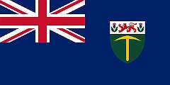 SOUTHERN RHODESIA, 1924 - In 1895, the area administered by the British South Africa Company was named “Rhodesia” by British settlers in honour of its founder, Cecil Rhodes, and the area south of the Zambesi River became known as South Rhodesia. In 1923, it became a self-governing British colony, and the following year, it adopted its flag: a British Blue Ensign with, on the fly, a shield featuring a pick representing the gold mining industry on a green field representing agriculture. Above this are a lion and thistles from the coat of arms of Cecil Rhodes, the founder of the territory, on a white panel.