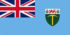 RHODESIA, 1965 - On 31 December 1963, the Federation of Rhodesia and Nyasaland was dissolved due to increasing pressure for independence; both Northern Rhodesia and Nyasaland gained independence in 1964 as Zambia and Malawi, respectively. The government of Southern Rhodesia, headed by Prime Minister Ian Smith, unsuccessfully attempted to persuade the British government to grant independence. On 11 November 1965, the government, headed by the Rhodesian Front, announced a Unilateral Declaration of Independence, unrecognised by the international community. Initially, it retained the flag of Southern Rhodesia, but in April 1964, the field of the flag was changed to sky blue.