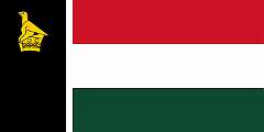 ZIMBABWE-RHODESIA, 1979 - In March 1978, as a result of international pressure, an “internal settlement” was reached between the white-minority government of Ian Smith and moderate African nationalist parties, creating an interim government that included Africans in leading positions. On 1 June 1979, Zimbabwe Rhodesia was proclaimed, and a new flag was adopted on 4 September of that year, designed by Flight Lieutenant Cedric Herbert of the Rhodesian Air Force. The soapstone statuette of the Zimbabwe Bird was placed on a black vertical stripe, symbolising the importance of majority rule and an older, pre-colonial source of power. Separated by a narrow white stripe were three horizontal stripes: red, representing the blood spilled in the struggle for majority rule; white, representing the European community and other minorities in the country’s life; and green, reflecting the importance of agriculture to the country’s well-being. Red, yellow, green and black are also the pan-African colours.