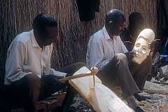Wood carvers in the “Matabele village”, Victoria Falls.