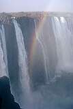 Rainbow Falls, with a rainbow in the afternoon, of “Mosi oa Tunya”,  Victoria Falls.