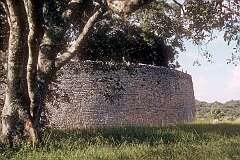 The great wall with its chevron patterned top around Great Zimbabwe.