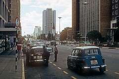 Jameson Avenue in Salisbury, as it was called in 1975, the capital of (South) Rhodesia; now Harare, the capital and most populous city of Zimbabwe; The street was renamed Samora Michel Avenue in the early 1980s.